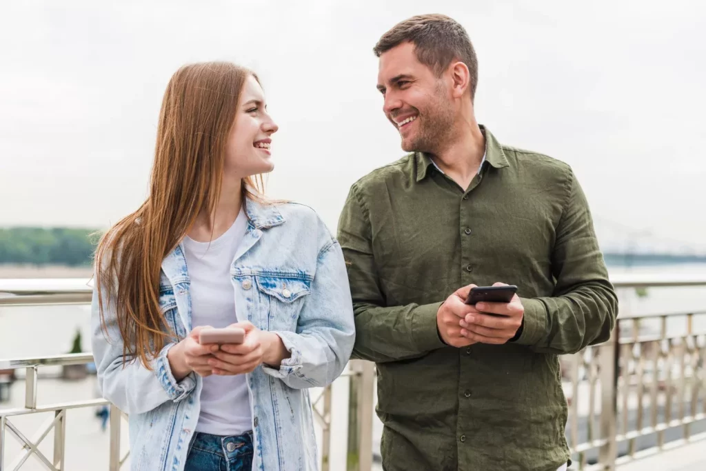 Smiling couple looking at each other