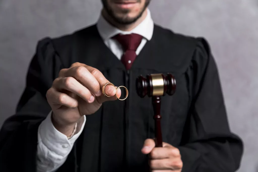 Judge with golden rings and gavel