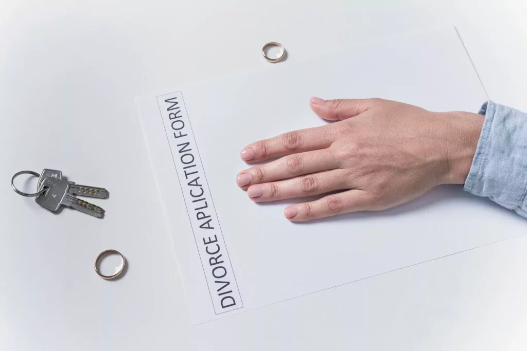 Man handing off divorce application form