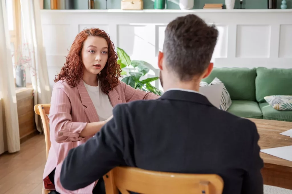 A girl is discussing divorce with mediator