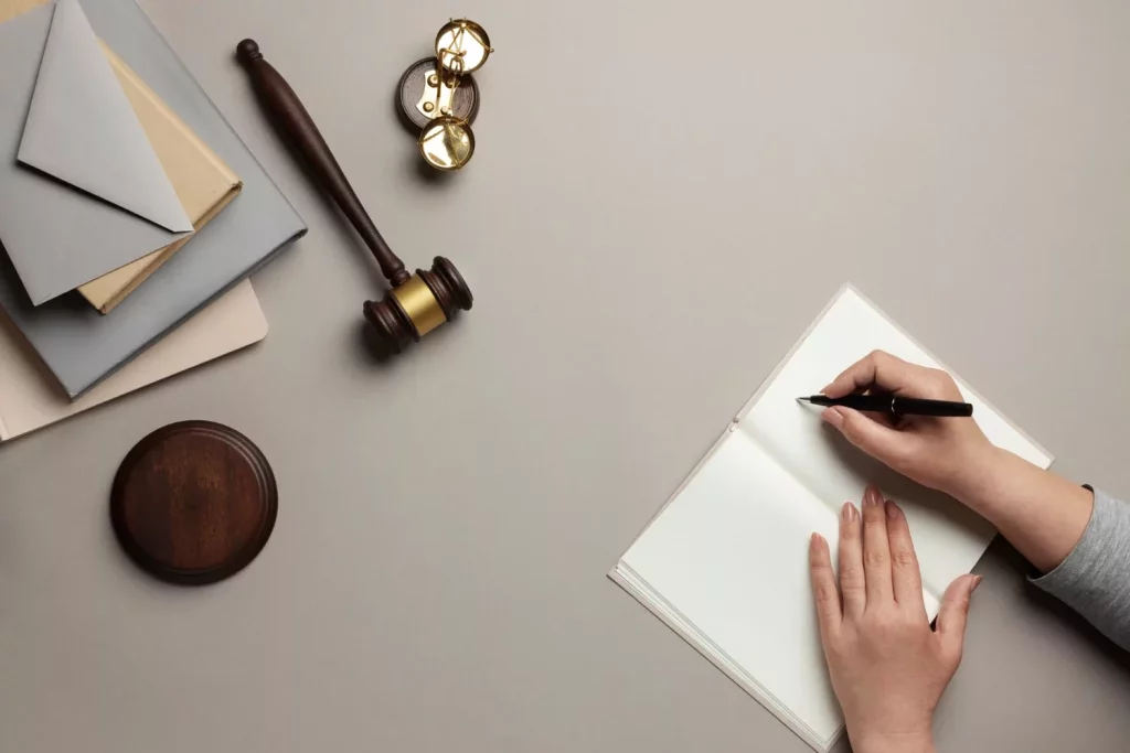 Lawyer signing a document