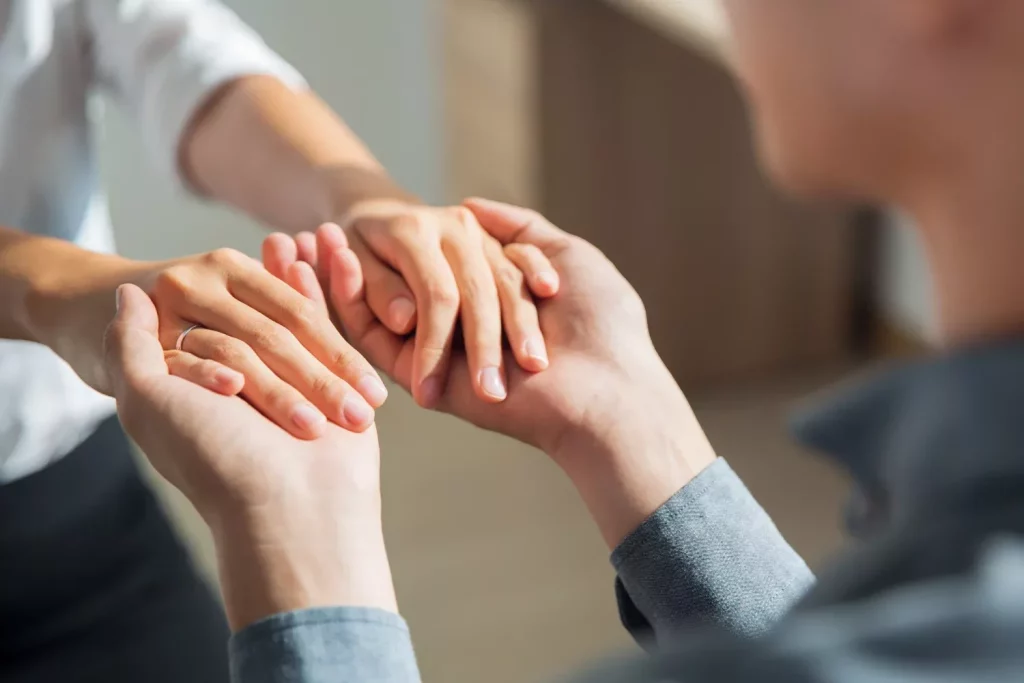 Couple holding hands