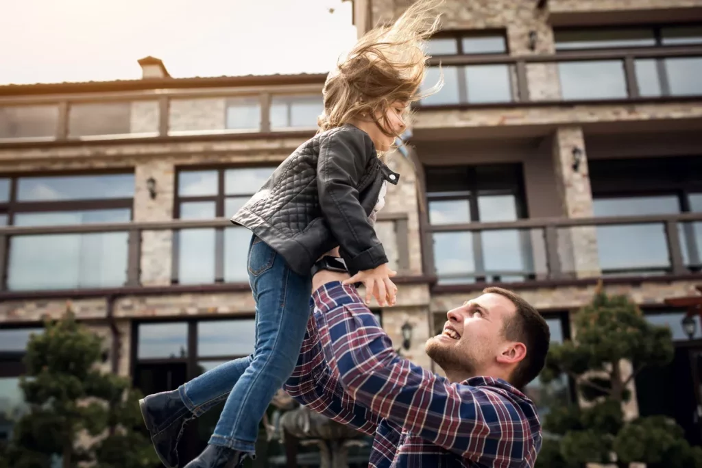 Dad playing with daughter