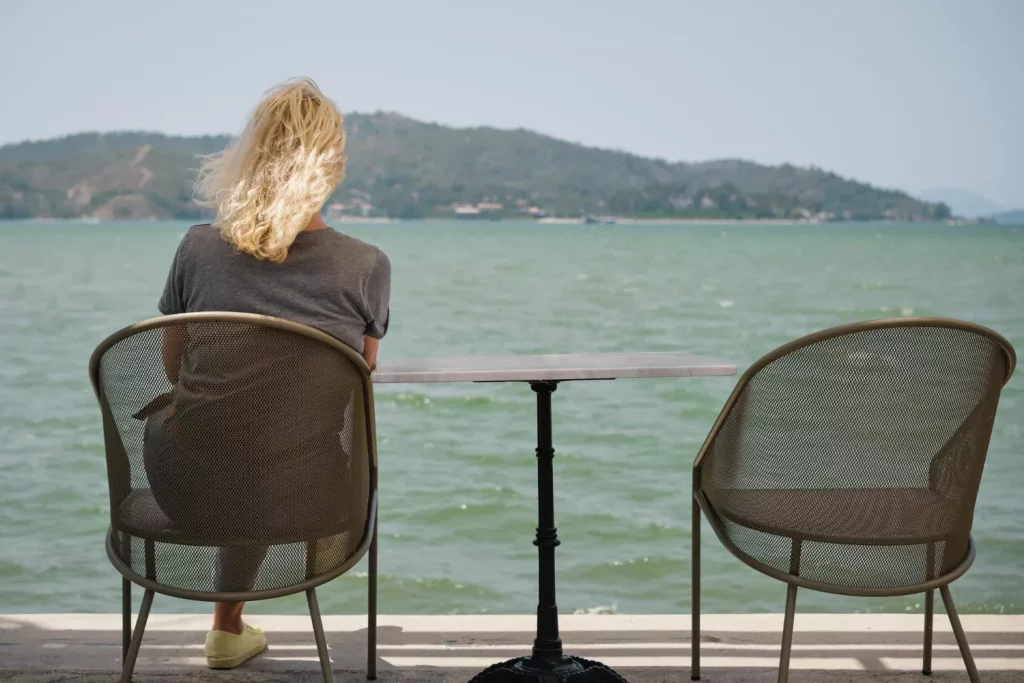 Woman sitting lonely on a chair