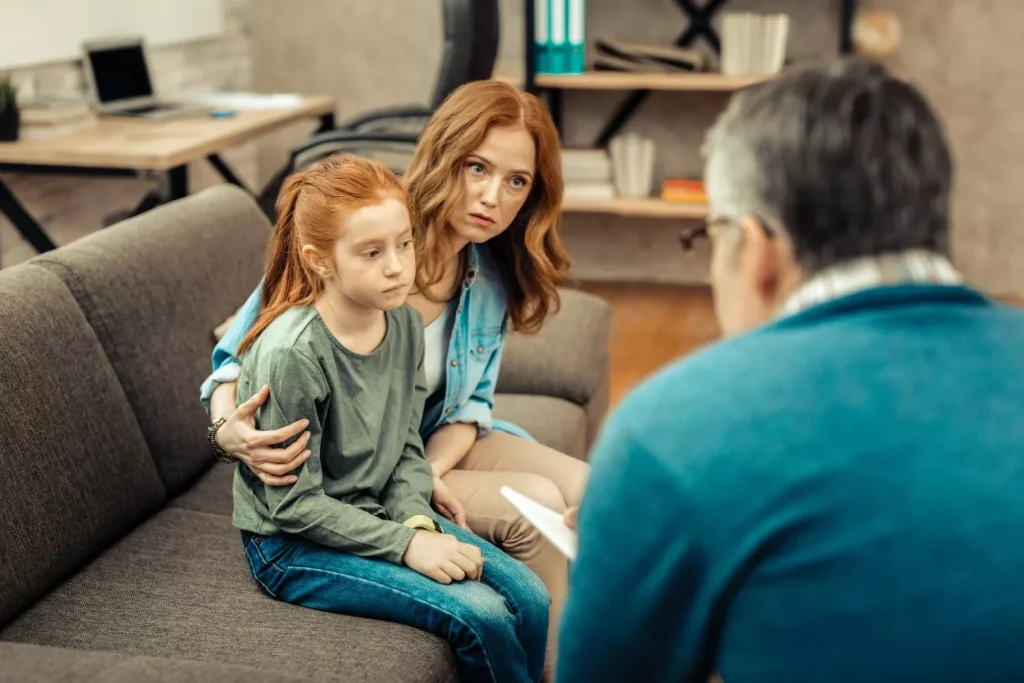 Mom sitting with a daughter