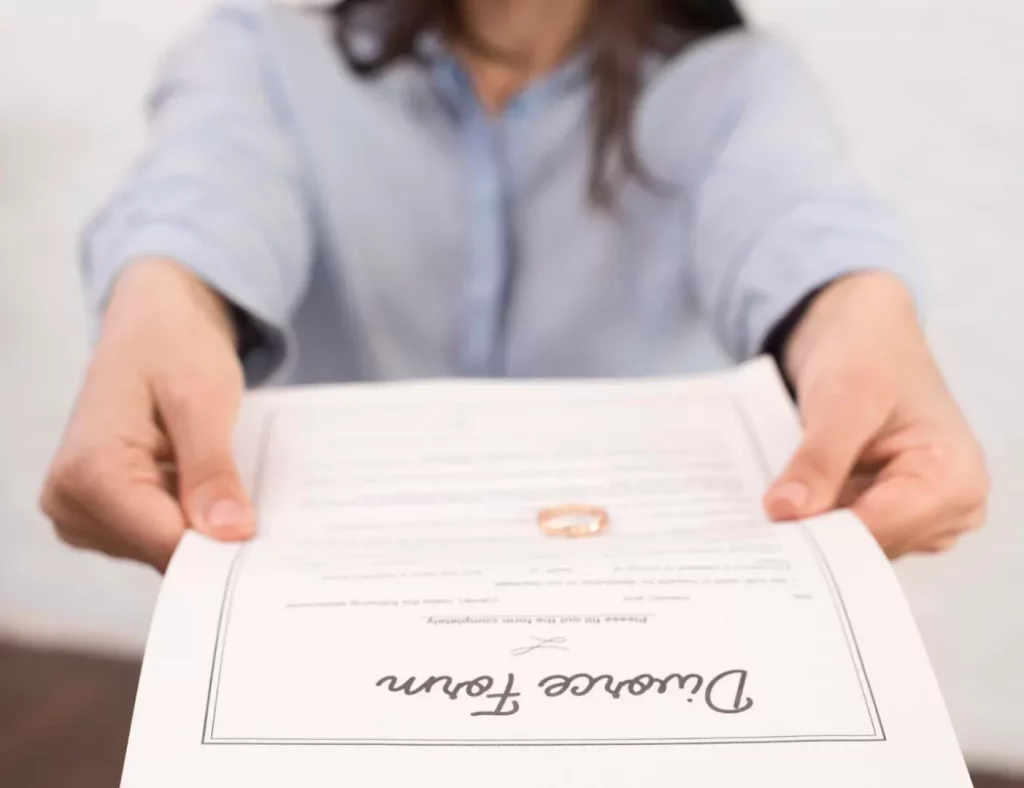 Woman holding divorce form